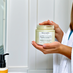 Probiotic Skincare Routine**

"A woman with healthy, glowing skin, applying a cream from a simple, elegant jar labeled 'Probiotic Skin Cream', in a bright and airy bathroom. Fully clothed in a comfortable robe, appropriate content, safe for work. Focus on clear, healthy skin. Perfect anatomy, correct proportions, natural pose, well-formed hands, proper finger count, natural body proportions, professional, modest, family-friendly, high quality, professional photography."

**